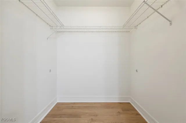 a view of an empty walk in closet