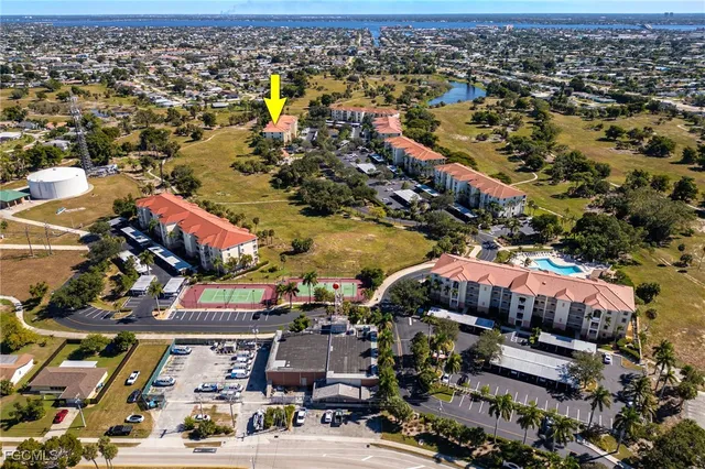 an aerial view of a city with lots of residential buildings