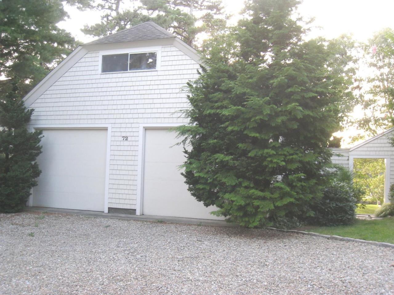 72 Clam Shell Point Lane Cotuit, MA 02635 - Photo 2 of 35 a view of backyard of house and trees