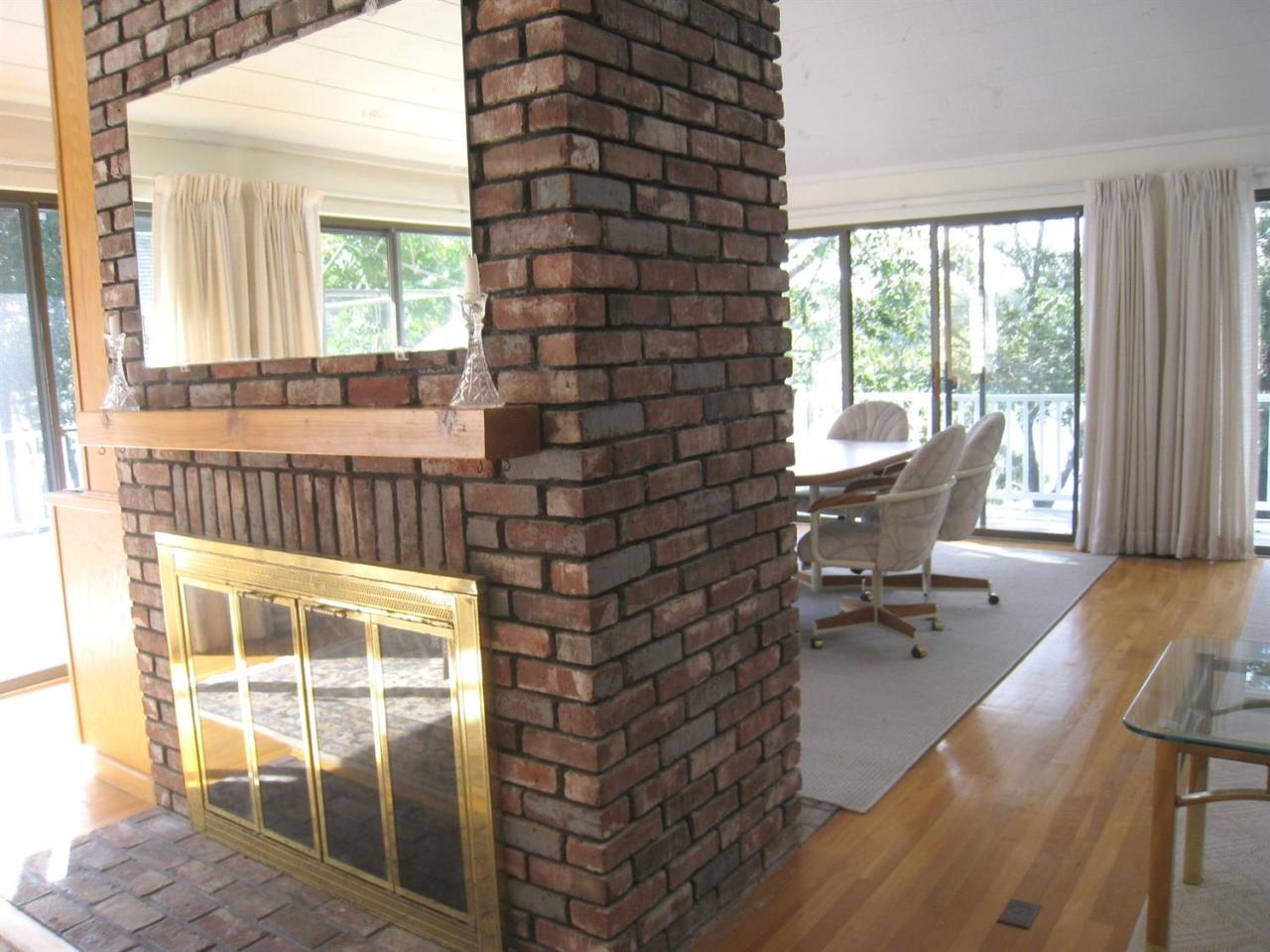 72 Clam Shell Point Lane Cotuit, MA 02635 - Photo 10 of 35 a living room with furniture and a window