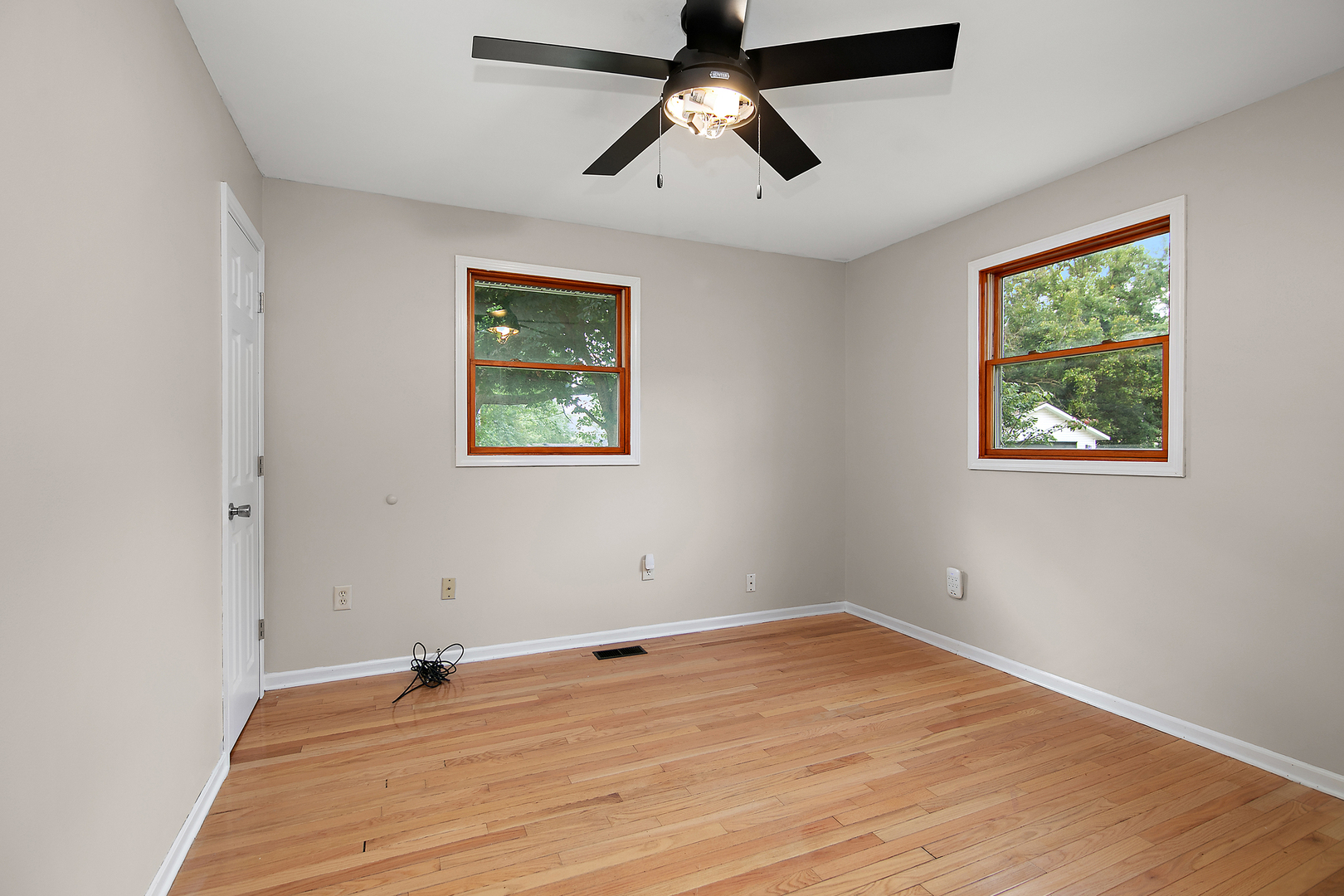 3926 East Chestnut Street Kankakee, IL 60901 - Photo 6 of 14 a view of empty room with wooden floor