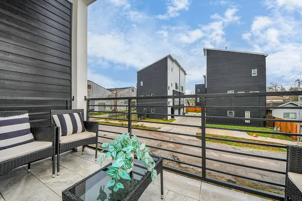 a view of a terrace with outdoor seating