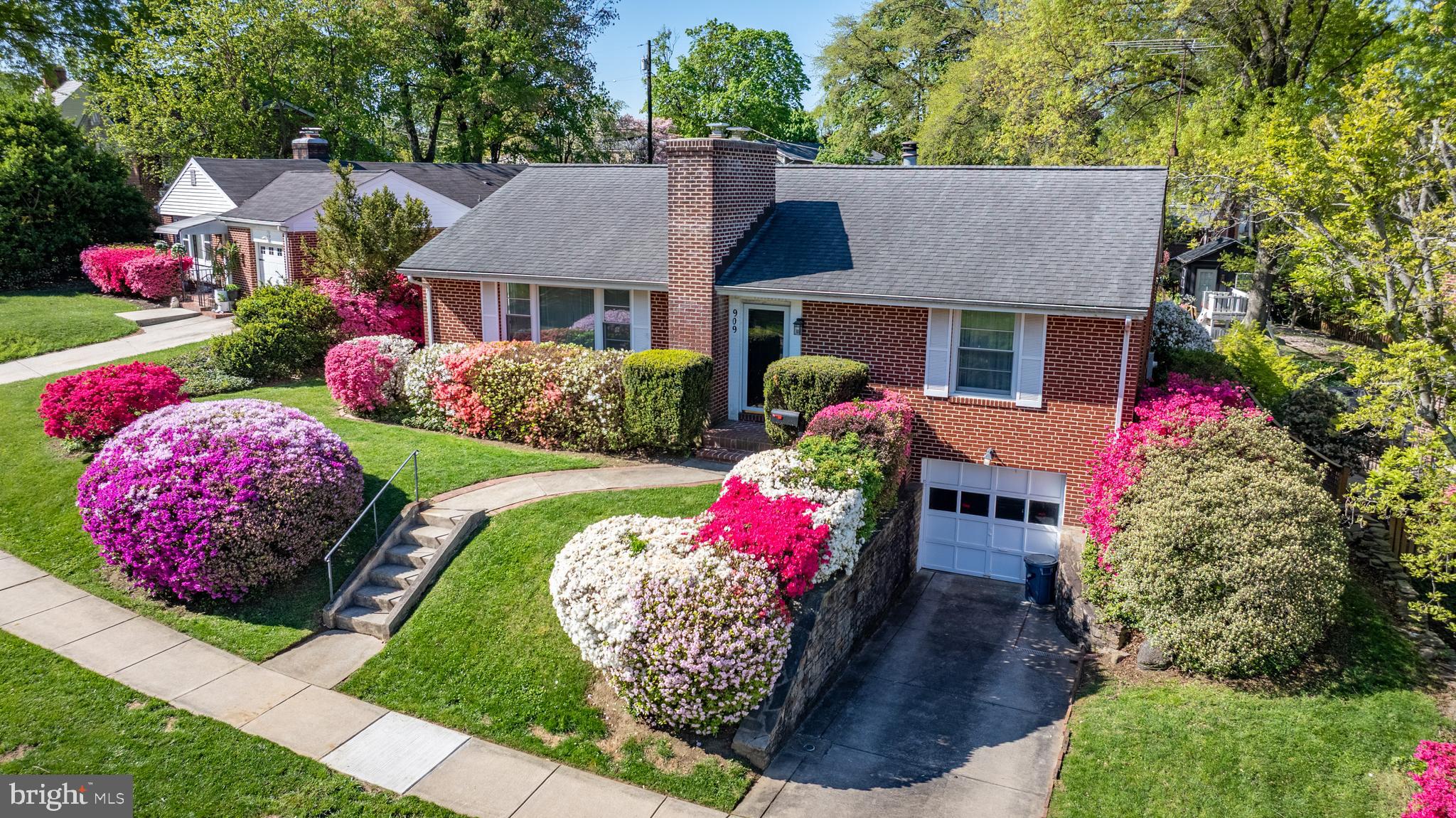 909 Weatherbee Road Towson, MD 21286 - Photo 2 of 51 a front view of house with yard and trees