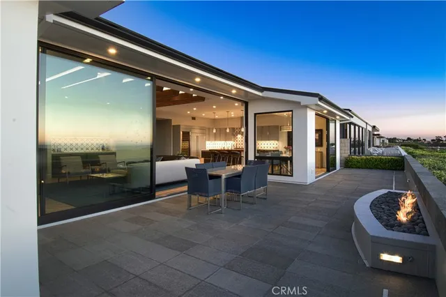 a lobby with furniture and a floor to ceiling window