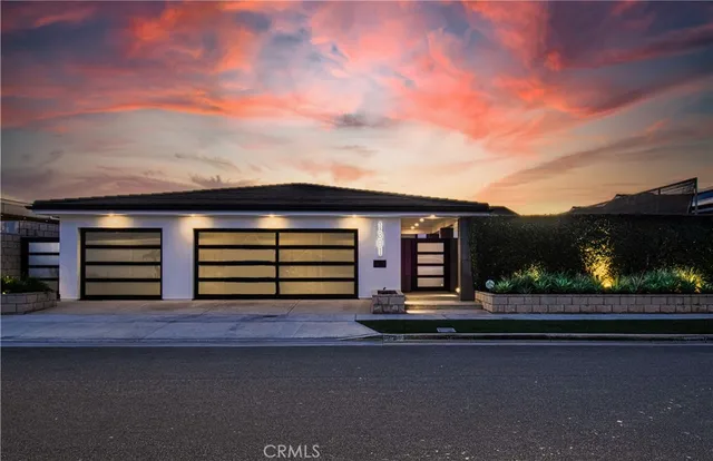 a view of a house with large area and windows