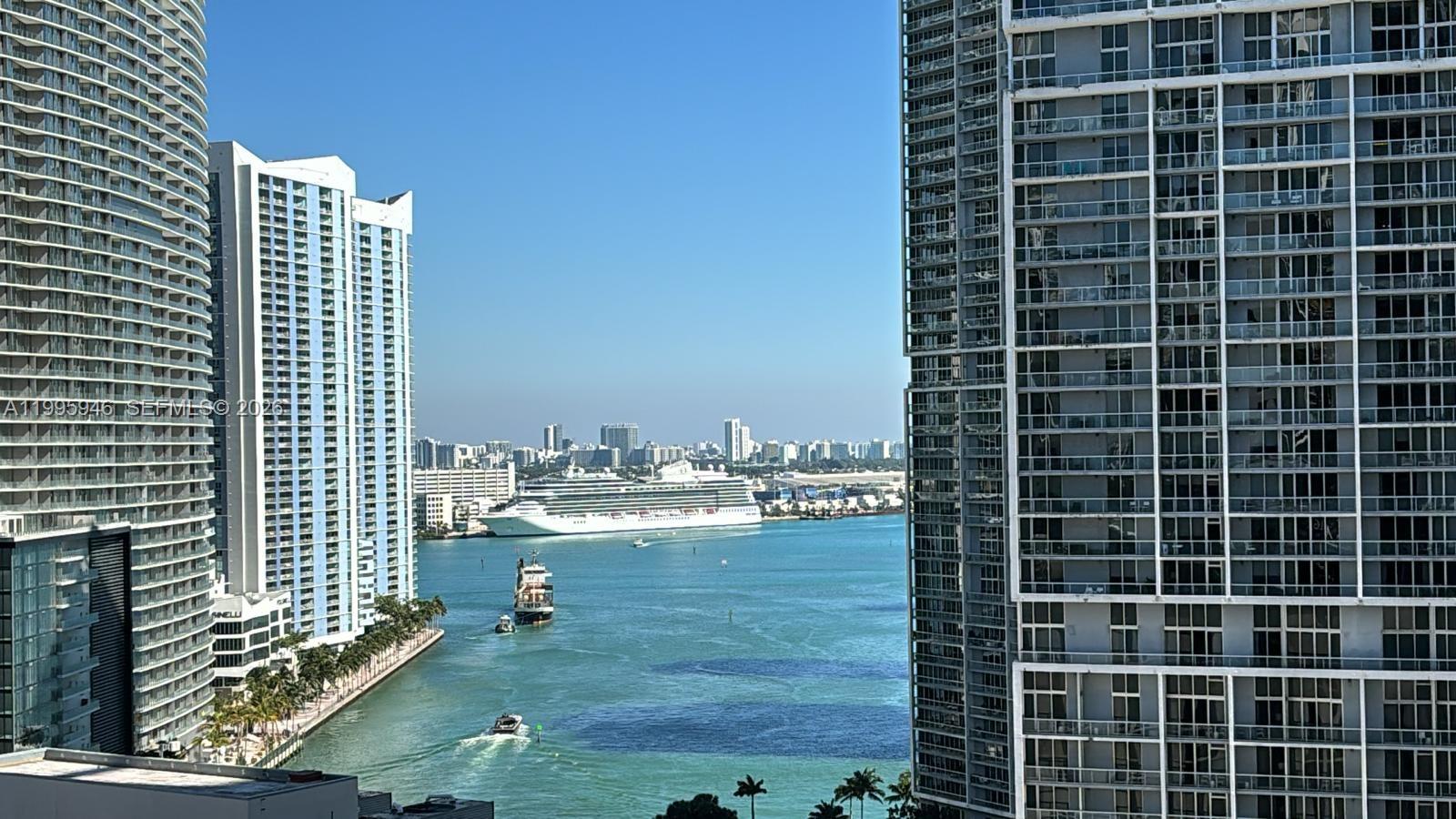 55 Southeast 6th Street, Unit 2005 Miami, FL 33131 - Photo 2 of 40 a view of a balcony with an outdoor space