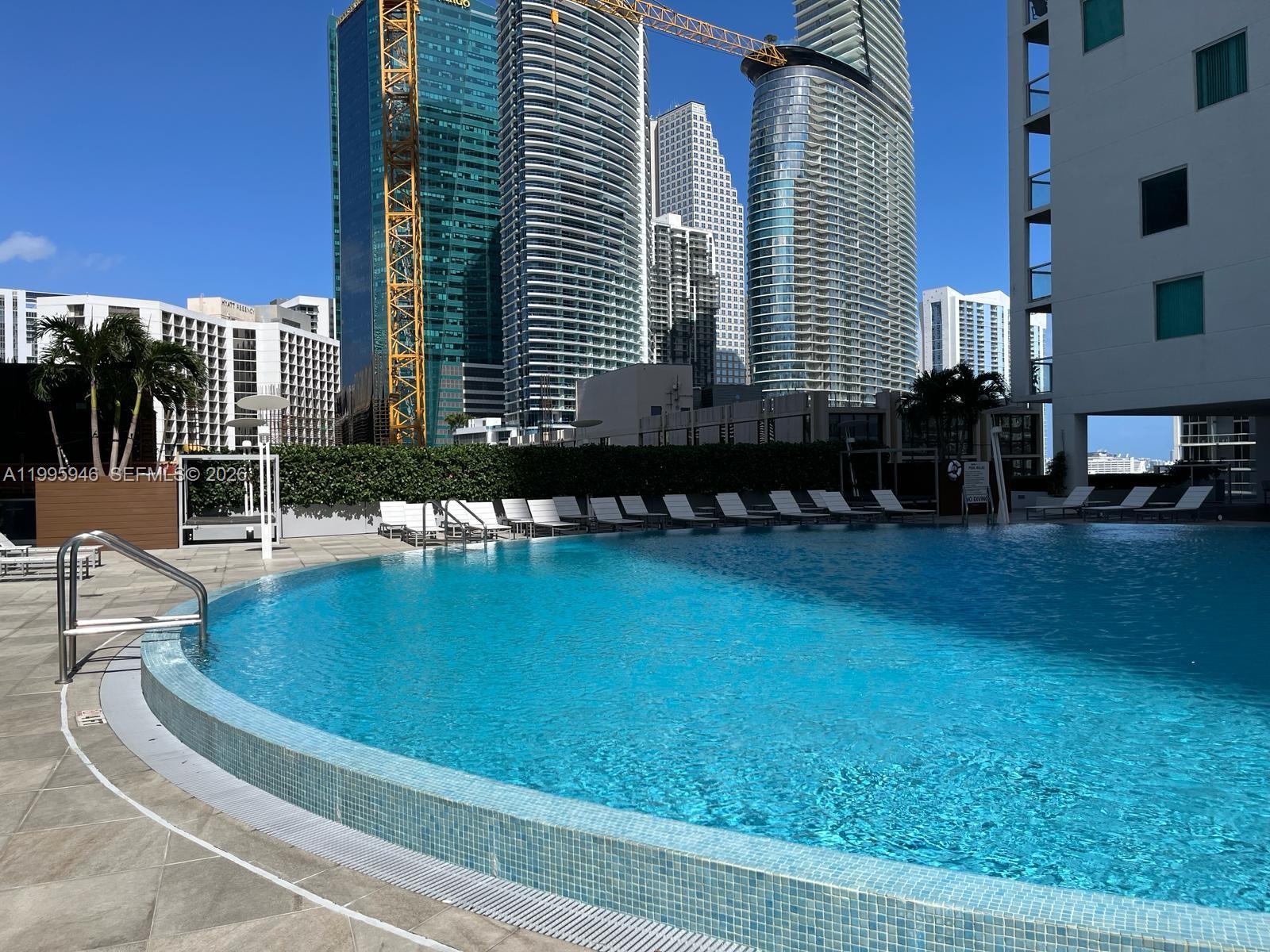 55 Southeast 6th Street, Unit 2005 Miami, FL 33131 - Photo 25 of 40 swimming pool view with outdoor space