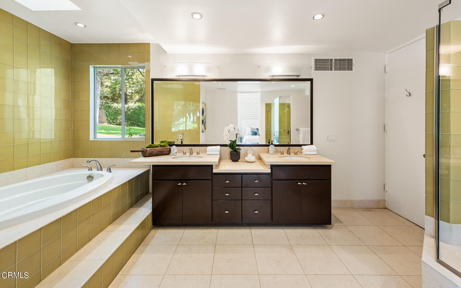 Undisclosed Address San Marino, CA 91108 - Photo 16 of 33 a spacious bathroom with a tub sink shower and mirror