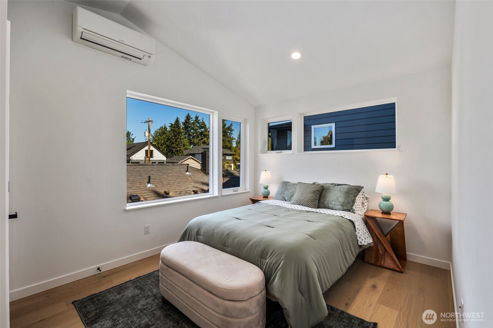 3807 Northeast 89th Street Seattle, WA 98115 - Photo 15 of 32 a bedroom with a bed and a painting on the wall