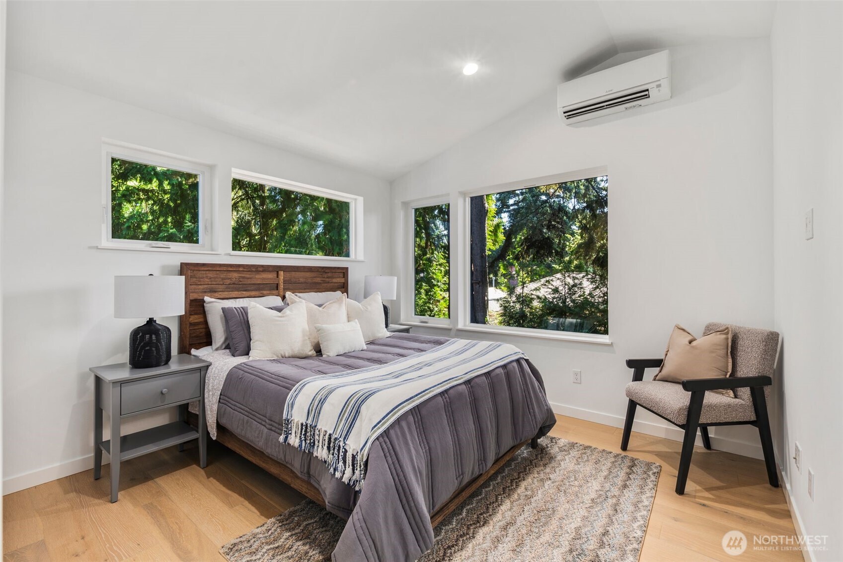 3807 Northeast 89th Street Seattle, WA 98115 - Photo 19 of 32 a bedroom with a bed and a window