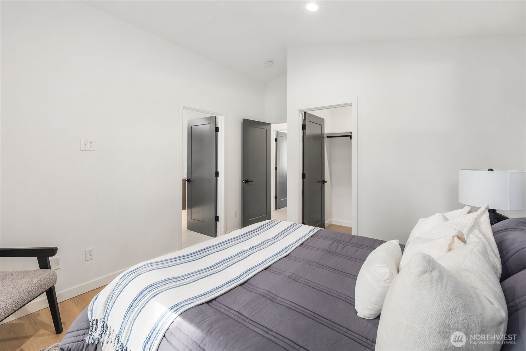 3807 Northeast 89th Street Seattle, WA 98115 - Photo 20 of 32 a bedroom with a bed and a closet