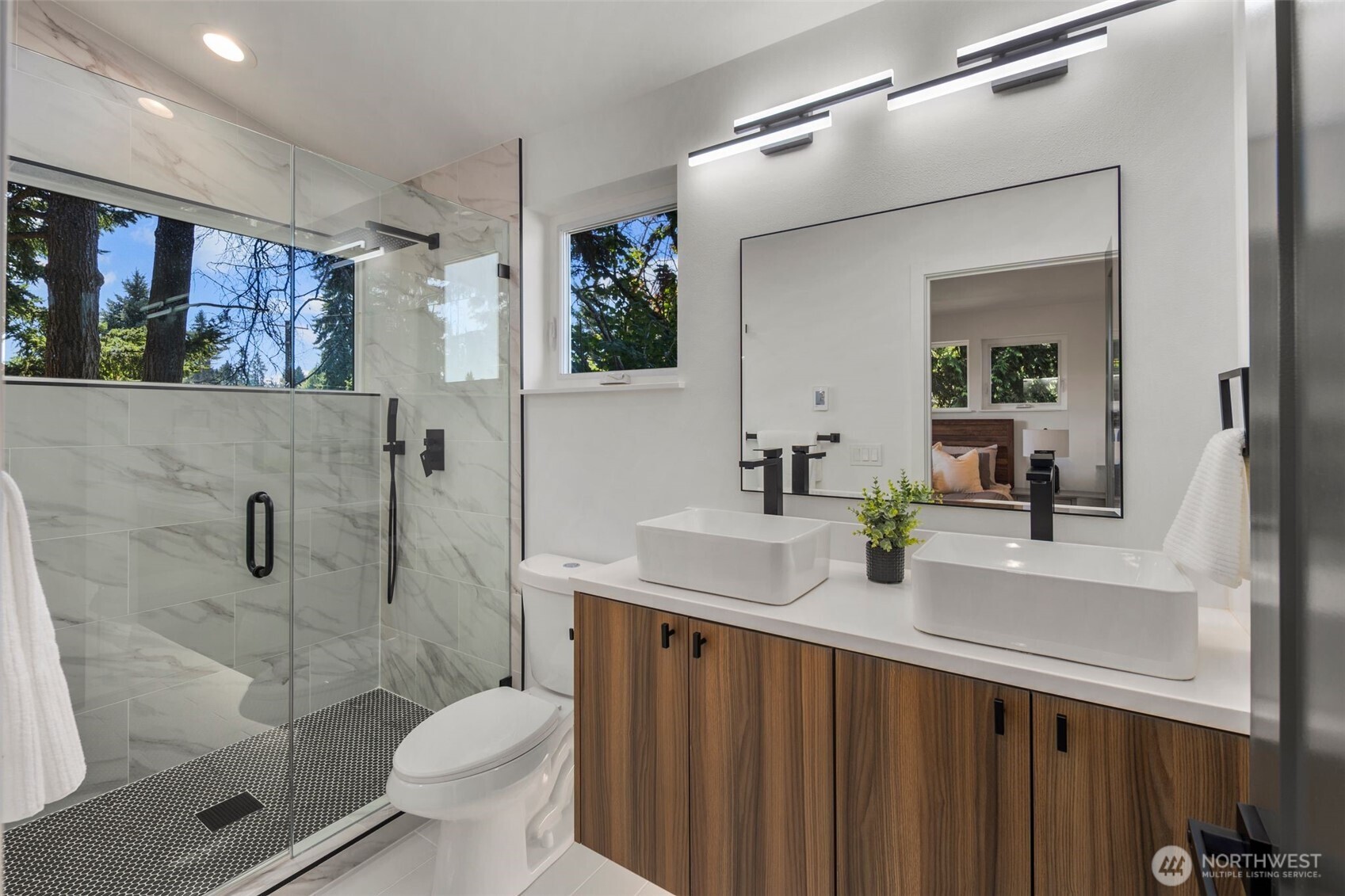 3807 Northeast 89th Street Seattle, WA 98115 - Photo 22 of 32 a bathroom with a sink toilet and shower