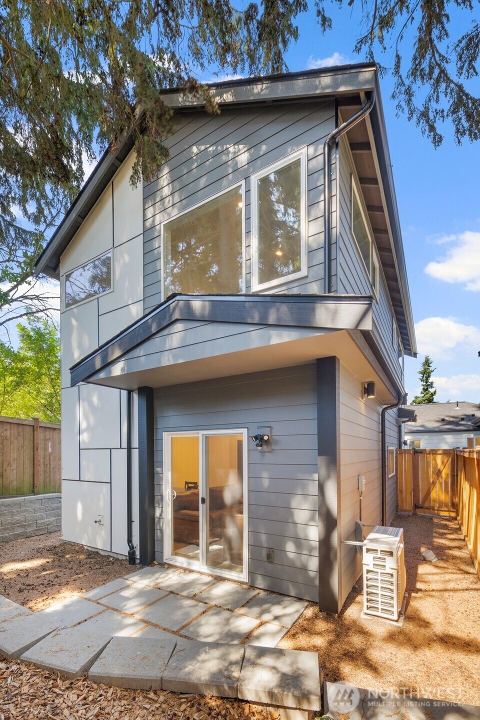 3807 Northeast 89th Street Seattle, WA 98115 - Photo 24 of 32 a front view of a house with a garage
