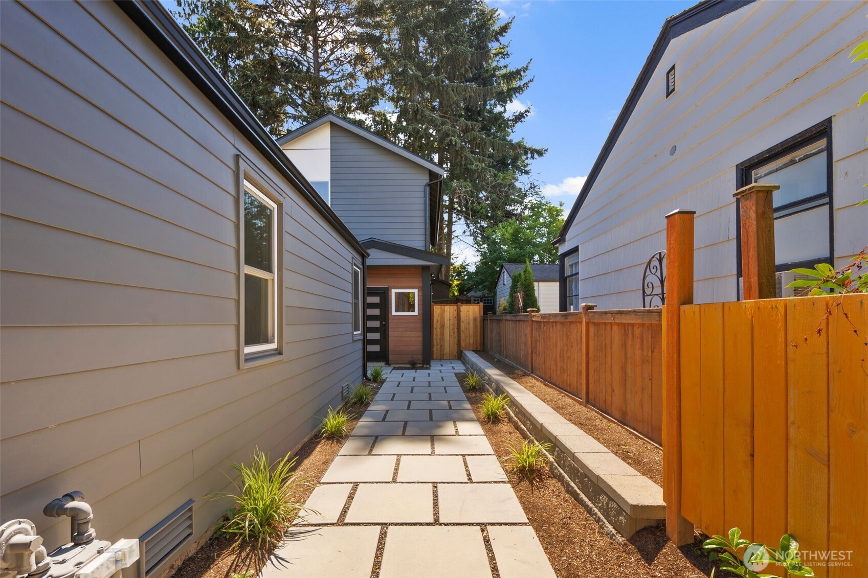 3807 Northeast 89th Street Seattle, WA 98115 - Photo 27 of 32 a view of a pathway with a house
