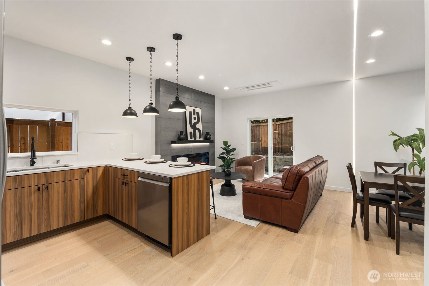 3807 Northeast 89th Street Seattle, WA 98115 - Photo 5 of 32 a kitchen with stainless steel appliances granite countertop a stove and a sink