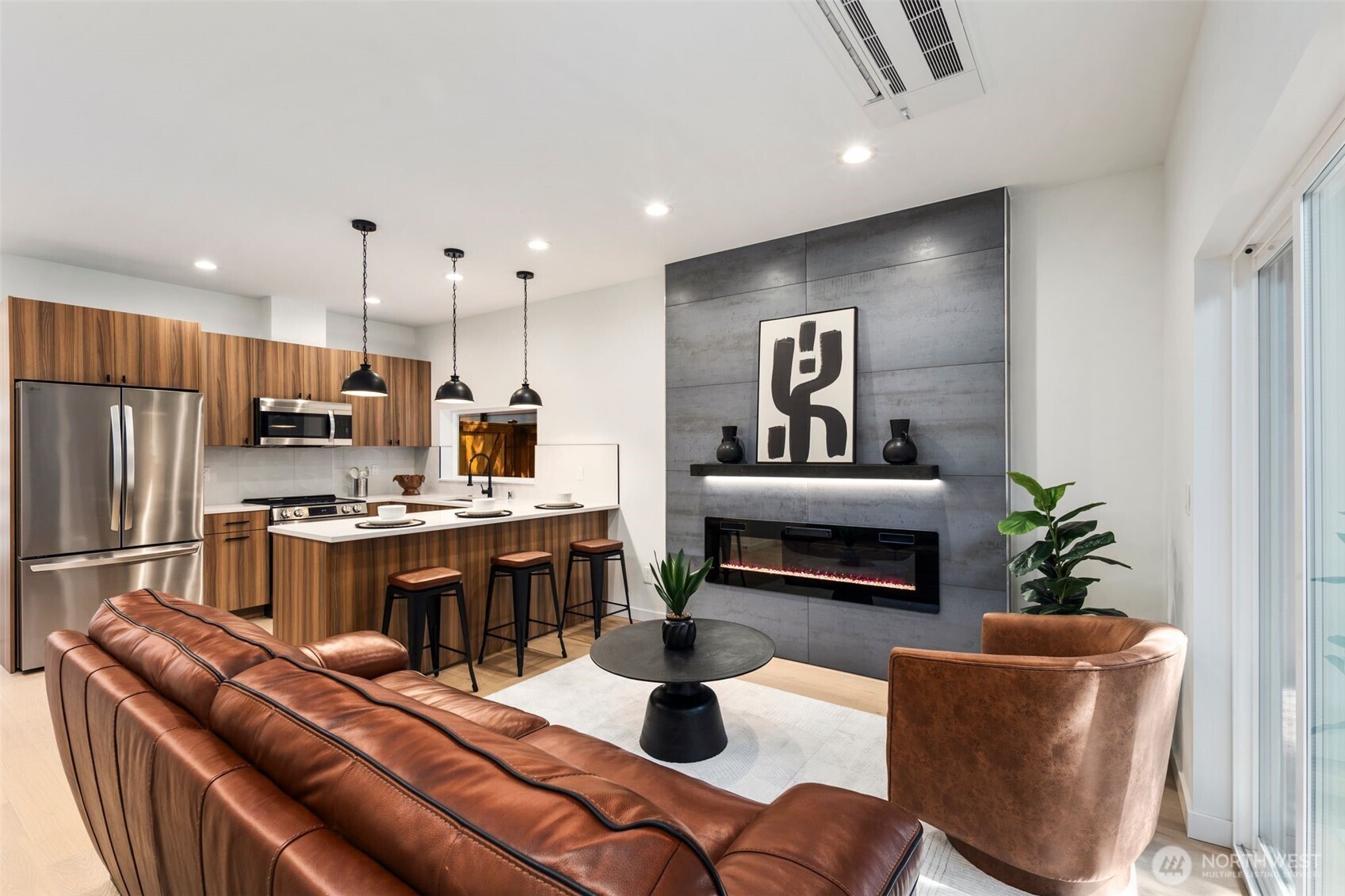 3807 Northeast 89th Street Seattle, WA 98115 - Photo 9 of 32 a kitchen with sink a stove and chairs