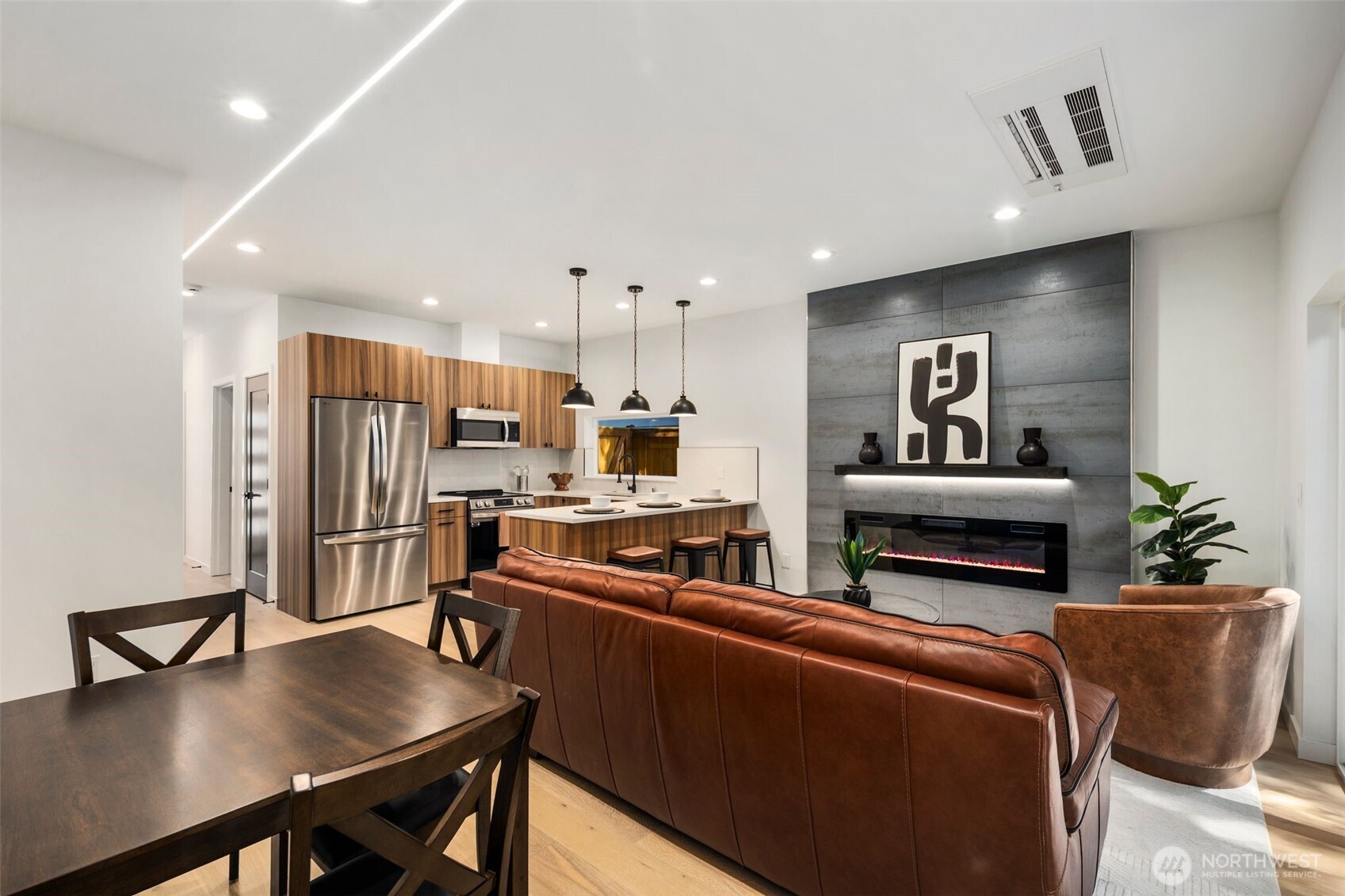3807 Northeast 89th Street Seattle, WA 98115 - Photo 10 of 32 a living room with furniture a dining table and kitchen view