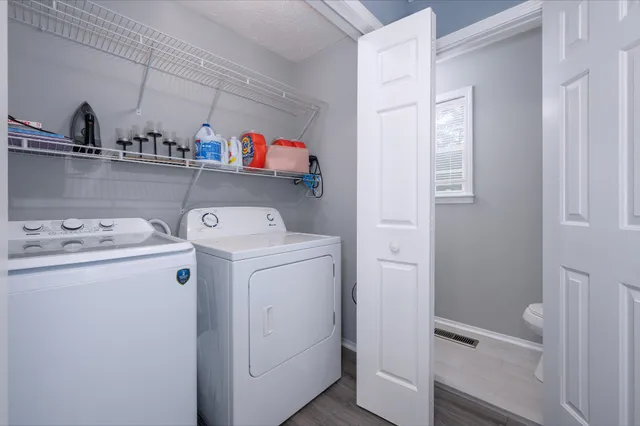 a utility room with dryer and washer