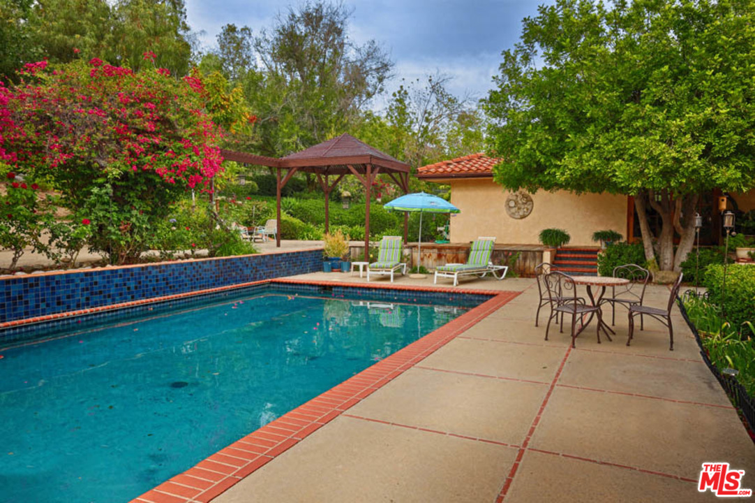 11345 Riverwood Drive Tujunga, CA 91042 - Photo 23 of 54 a view of a backyard with sitting area