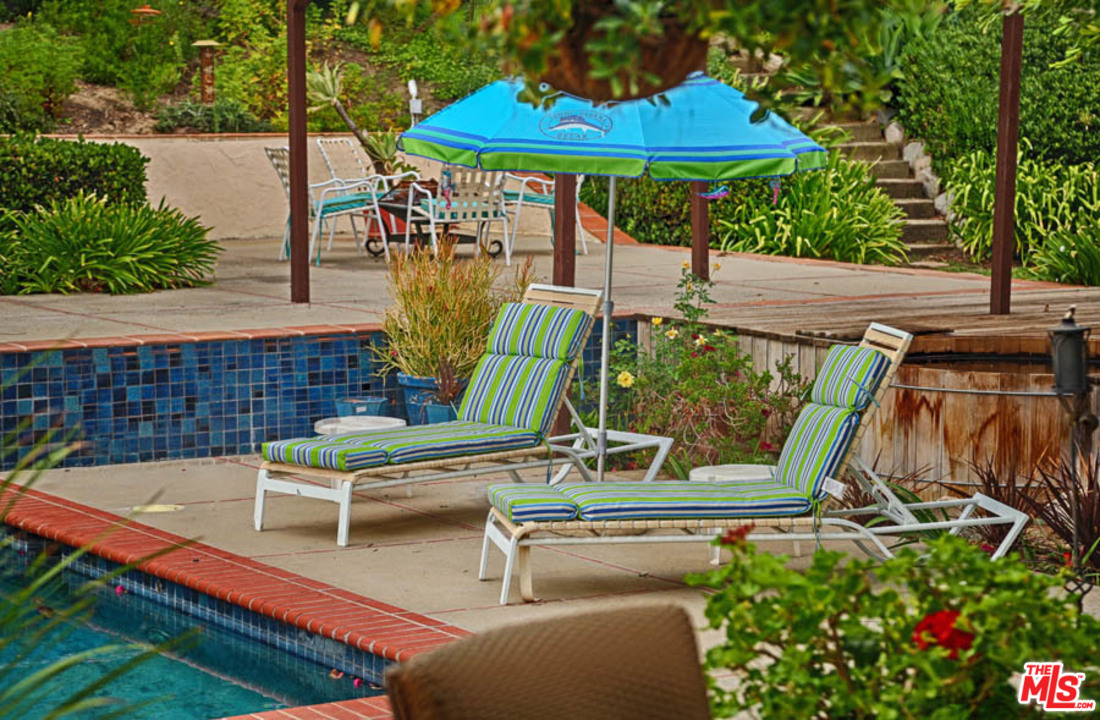 11345 Riverwood Drive Tujunga, CA 91042 - Photo 24 of 54 swimming pool view with a seating space