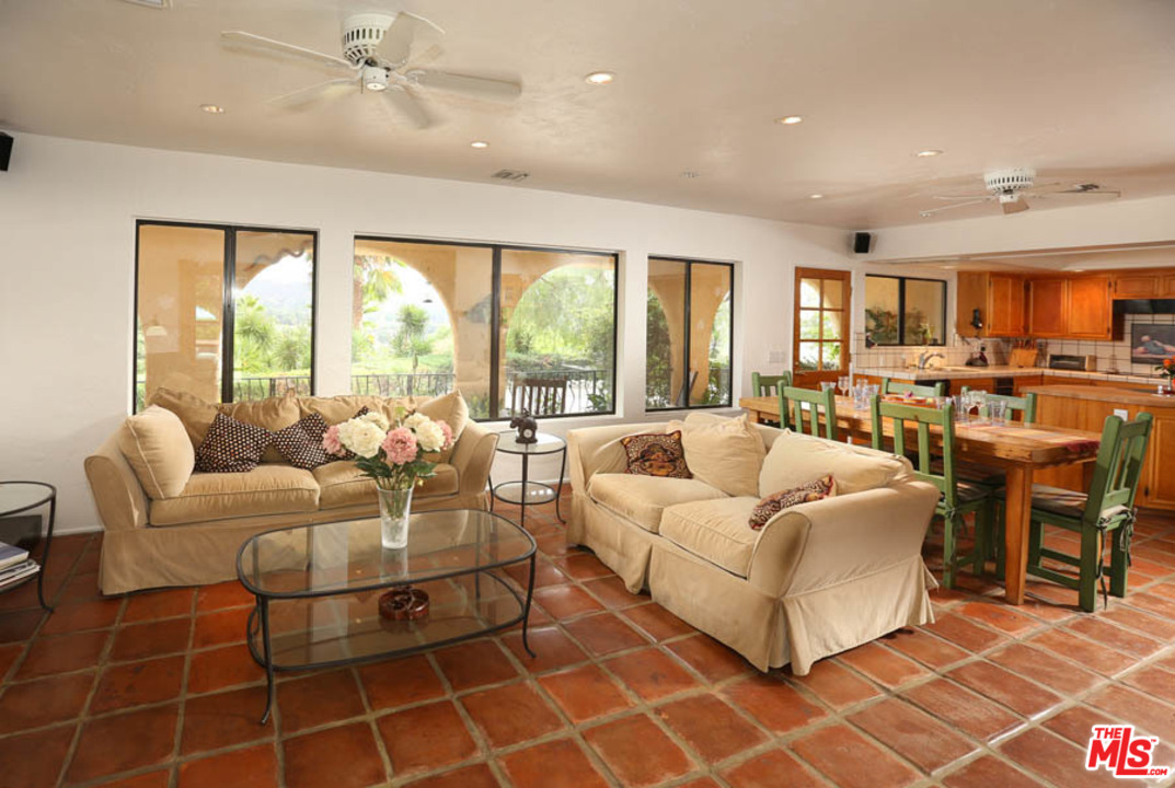 11345 Riverwood Drive Tujunga, CA 91042 - Photo 8 of 54 a living room with furniture and a large window