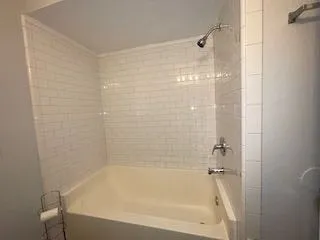 a bathroom with a bathtub