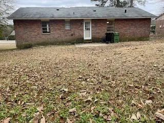 a view of a stone house with a sink