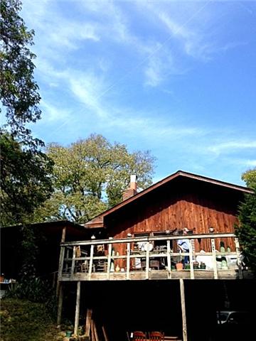 IT WAS COOL IN ITS DAY....IN NEED OF TLC OR A TOTALLY NEW STRUCTURE...OVER 3000 SQ FT OF RUSTIC DESIGN.