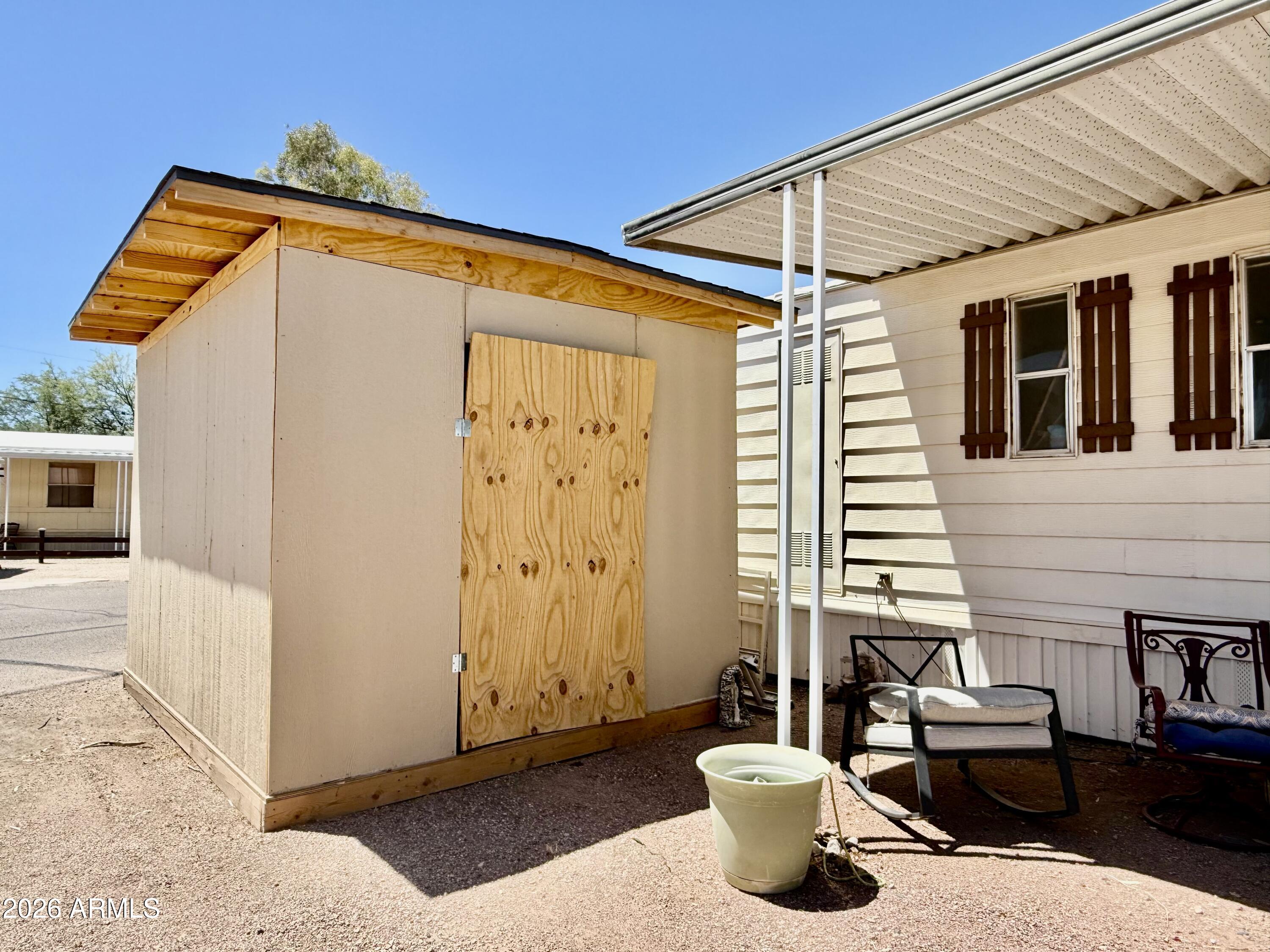 300 Airport Road, Unit 34 Kearny, AZ 85137 - Photo 13 of 18 a view of a patio with couches and potted plants