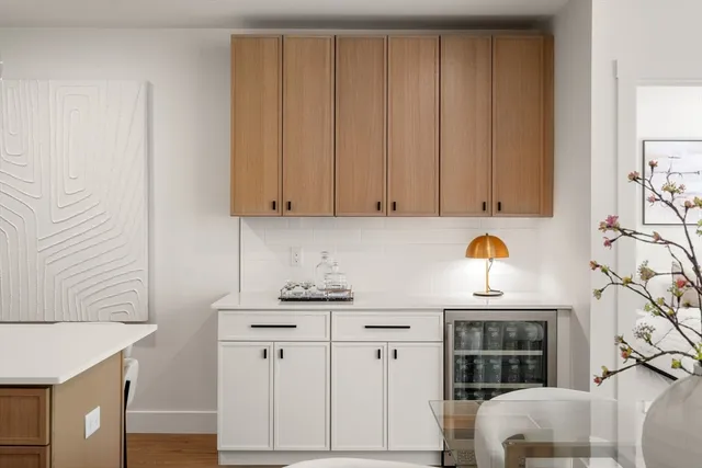 a view of cabinets and window