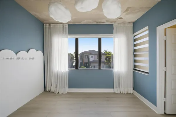 an empty room with windows