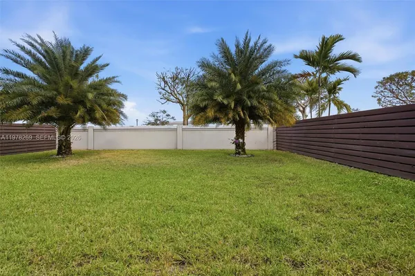 a view of a backyard with a garden