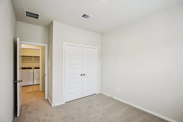 an empty room with closet