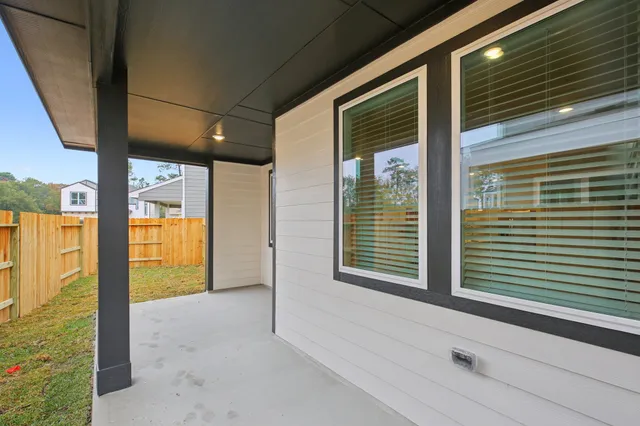 a view of a porch of a house