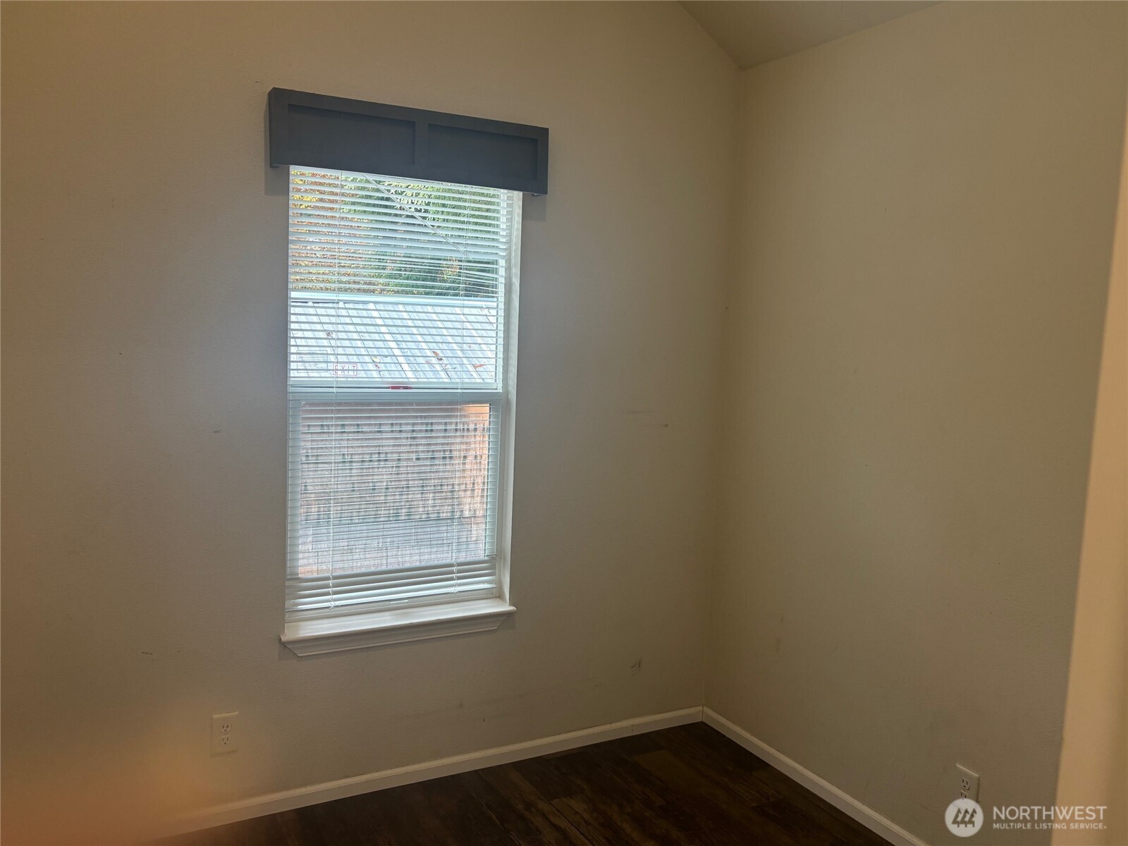 45182 Kimta Loop, Unit 3B84 Concrete, WA 98237 - Photo 14 of 37 a view of an empty room with wooden floor and a window