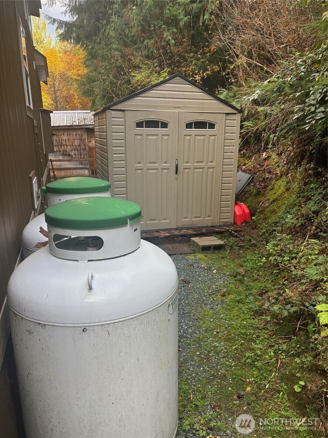 45182 Kimta Loop, Unit 3B84 Concrete, WA 98237 - Photo 18 of 37 a view of a bird house next to a yard