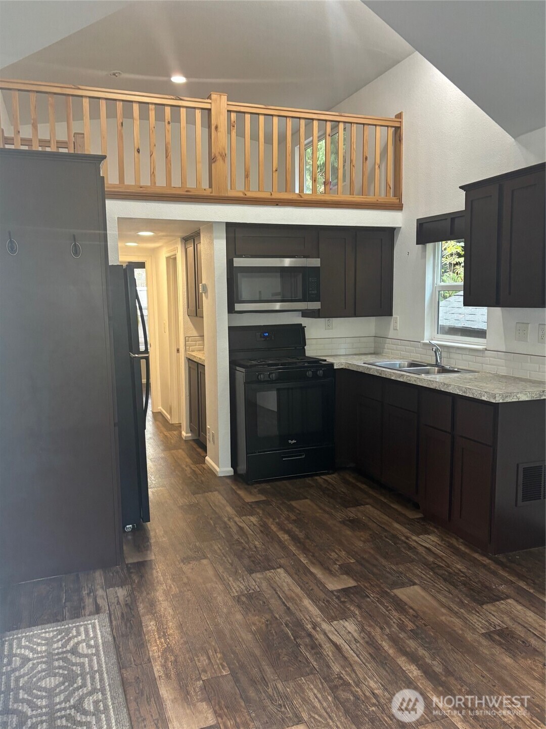 45182 Kimta Loop, Unit 3B84 Concrete, WA 98237 - Photo 3 of 37 a kitchen with granite countertop a sink and cabinets