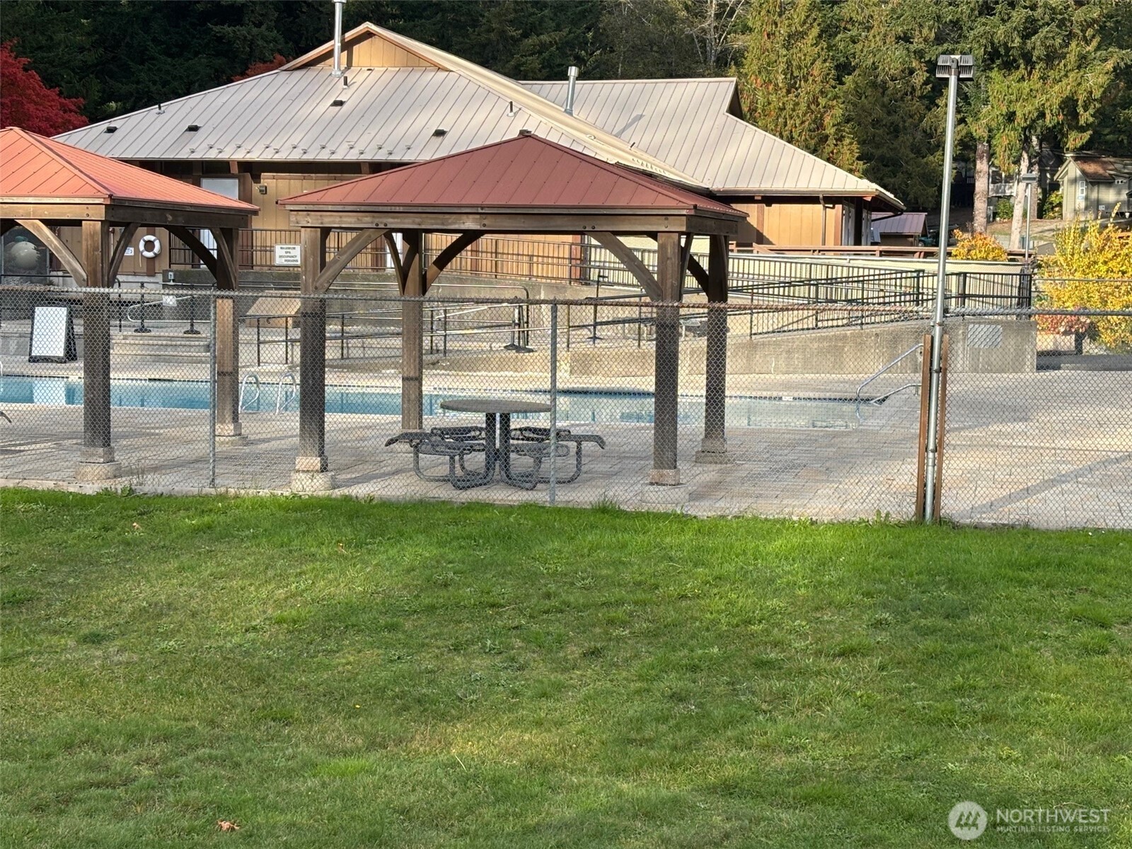 45182 Kimta Loop, Unit 3B84 Concrete, WA 98237 - Photo 34 of 37 a view of a house with backyard and sitting area