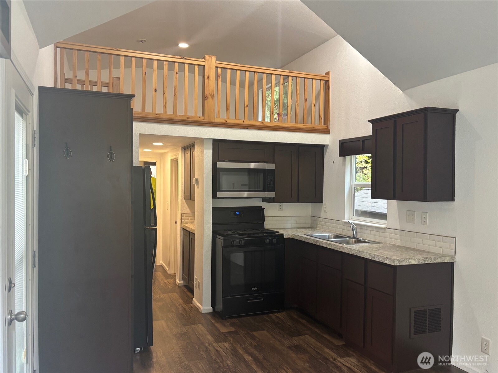 45182 Kimta Loop, Unit 3B84 Concrete, WA 98237 - Photo 4 of 37 a kitchen with stainless steel appliances granite countertop a refrigerator and a sink