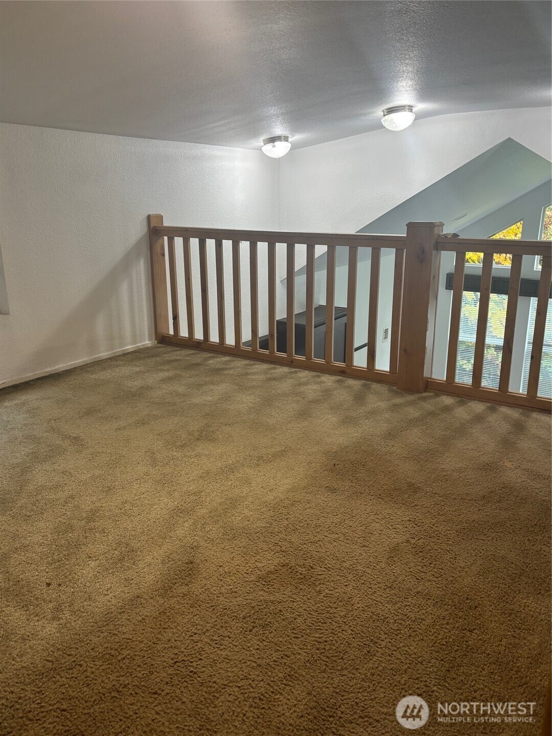 45182 Kimta Loop, Unit 3B84 Concrete, WA 98237 - Photo 8 of 37 a view of an empty room with glass door