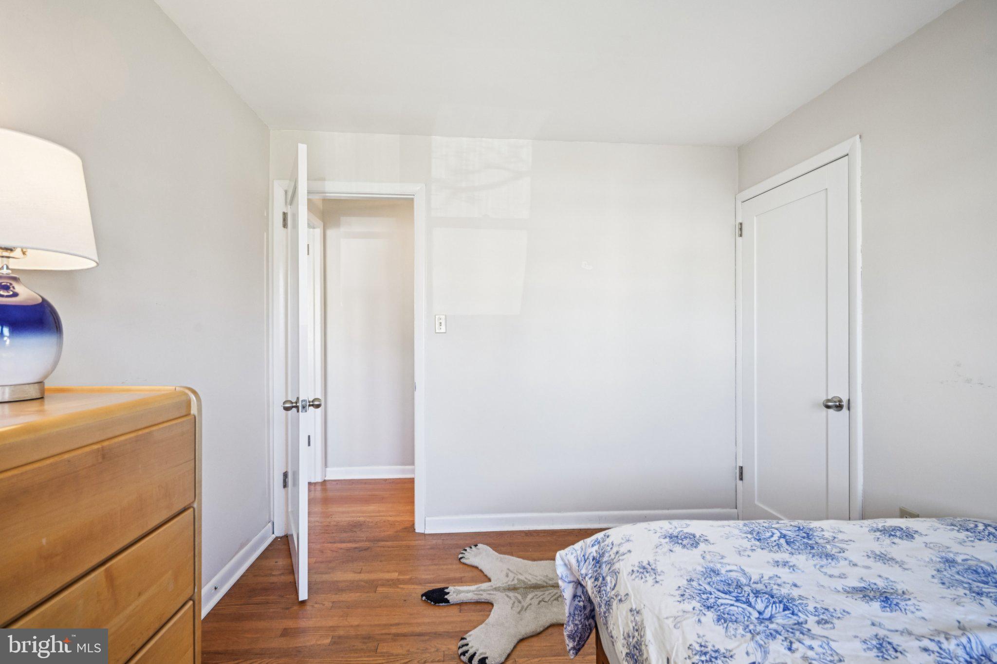 412 East Summit Avenue Haddonfield, NJ 08033 - Photo 29 of 35 a bedroom with a bed and wooden floor