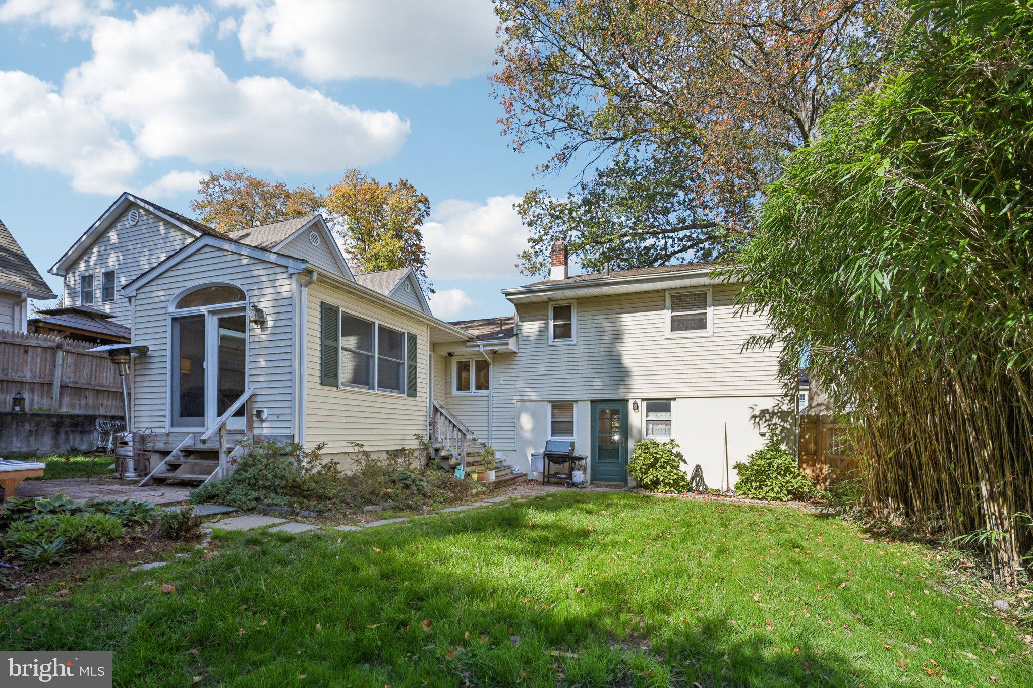 412 East Summit Avenue Haddonfield, NJ 08033 - Photo 32 of 35 a front view of a house with a yard and trees