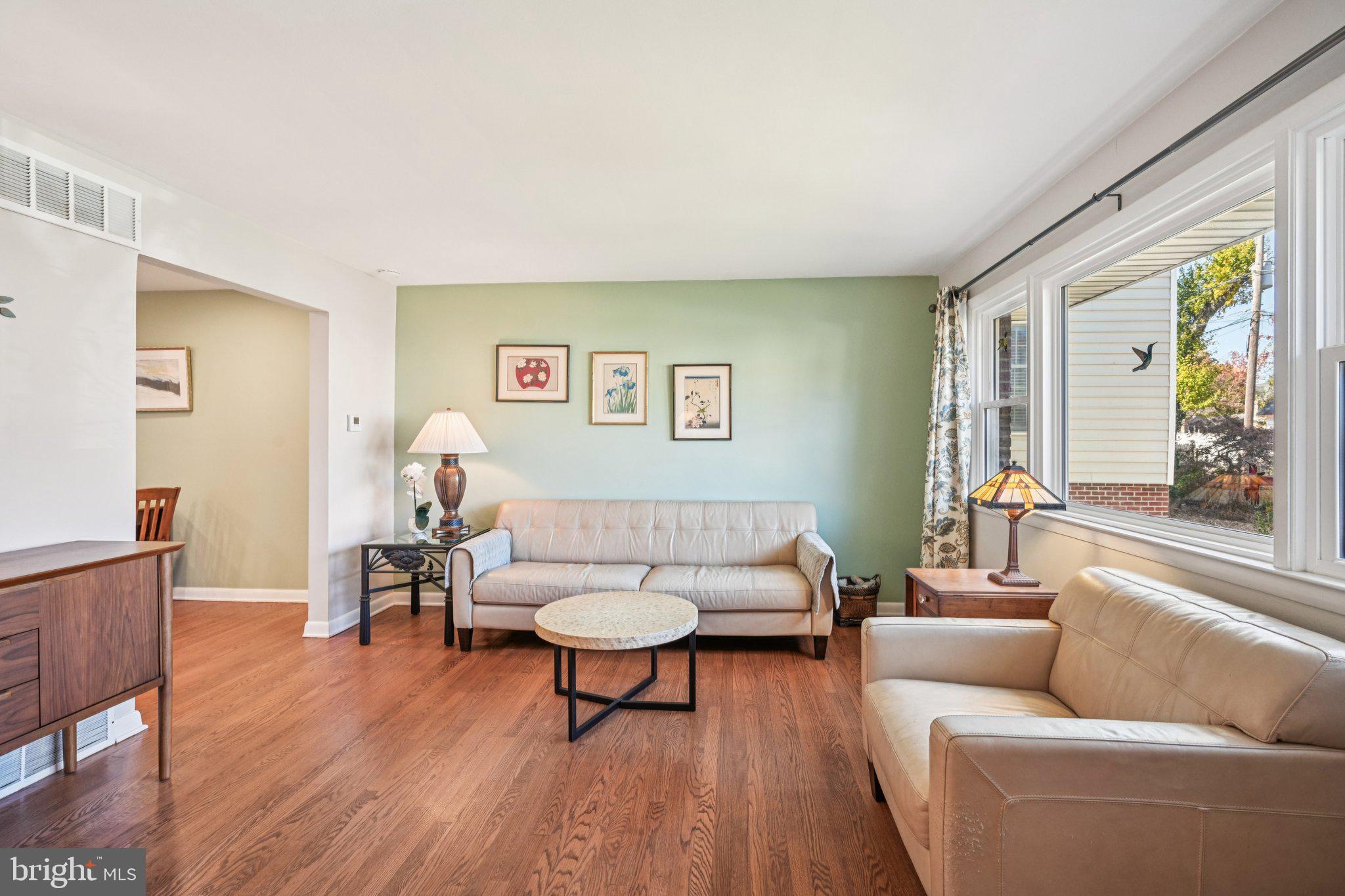 412 East Summit Avenue Haddonfield, NJ 08033 - Photo 5 of 35 a living room with furniture and a potted plant