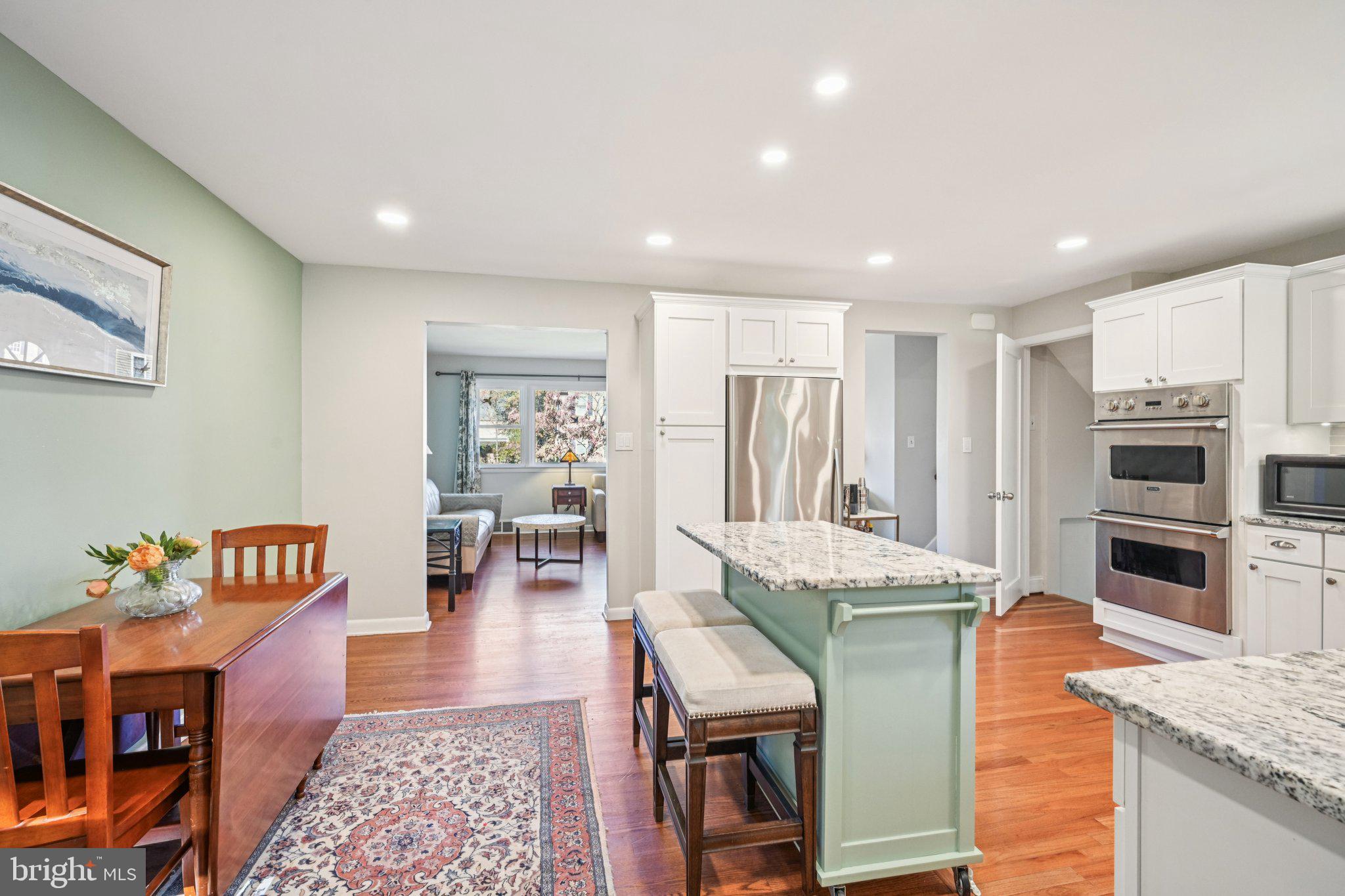 412 East Summit Avenue Haddonfield, NJ 08033 - Photo 8 of 35 a living room with furniture and kitchen view
