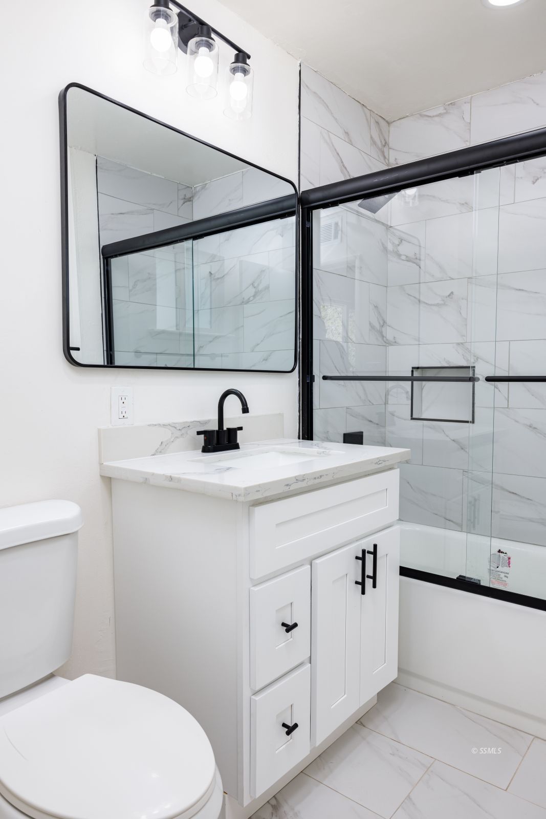 517 Vera Avenue Ridgecrest, CA 93555 - Photo 18 of 23 a bathroom with a sink and a mirror