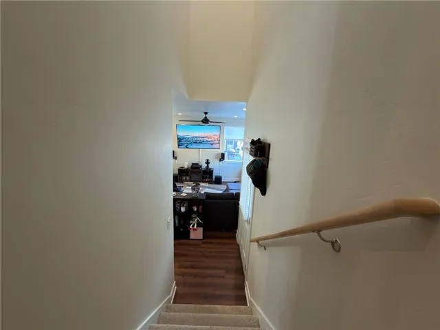 a kitchen with a refrigerator and a stove