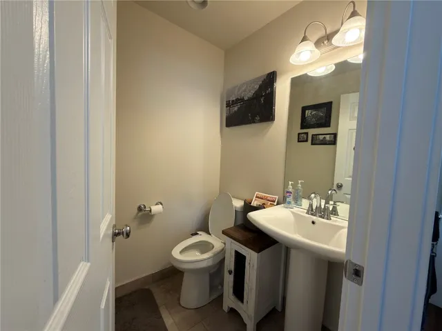 a bathroom with a sink and mirror