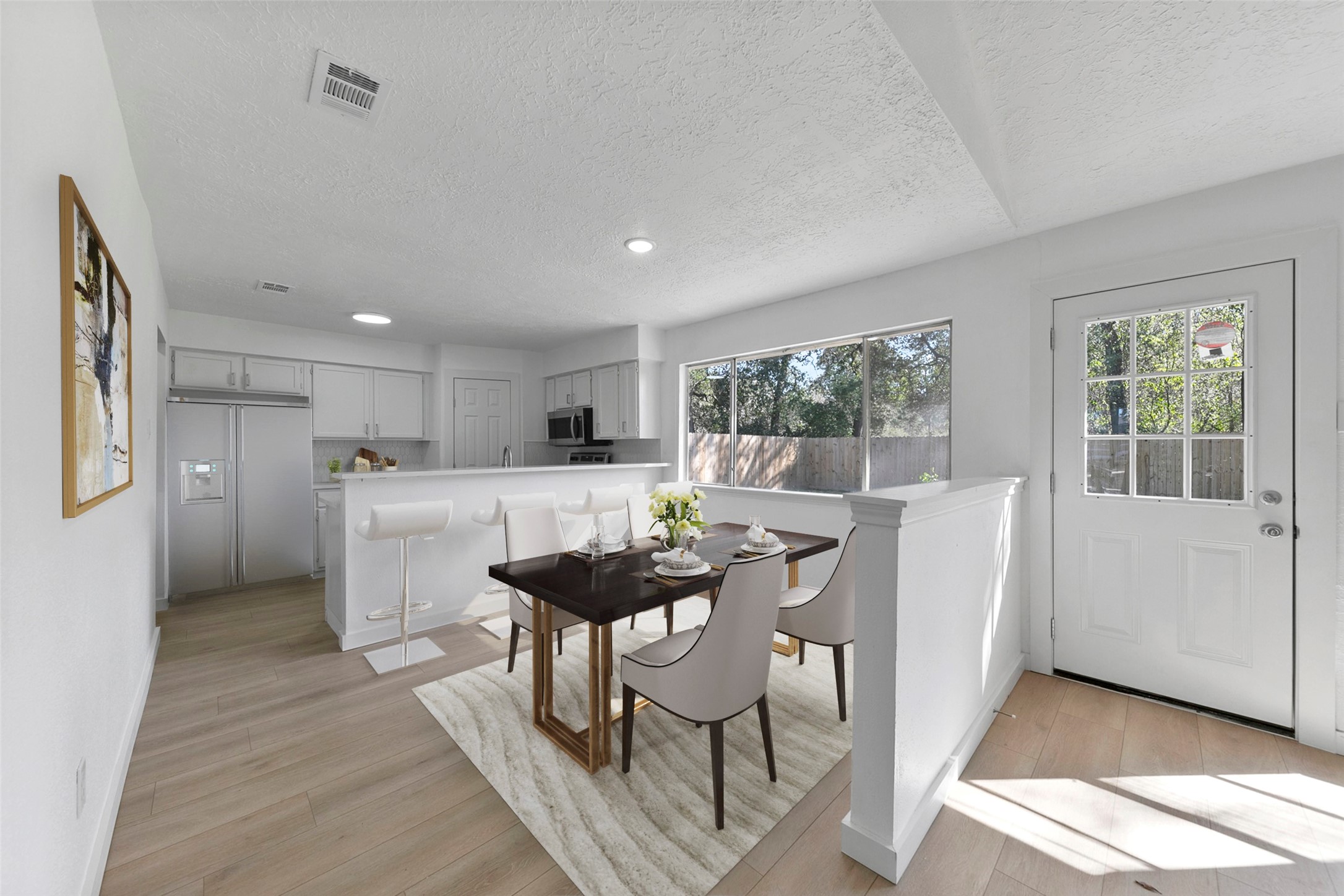 2042 Lexington Woods Drive Spring, TX 77373 - Photo 14 of 32 a view of a dining room with furniture and wooden floor