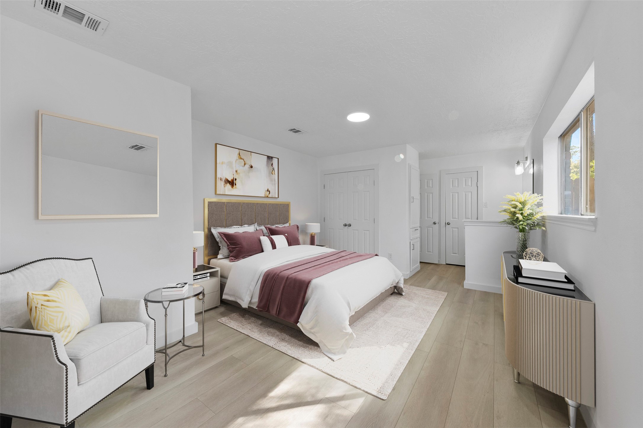 2042 Lexington Woods Drive Spring, TX 77373 - Photo 26 of 32 a spacious bedroom with a bed and a couch