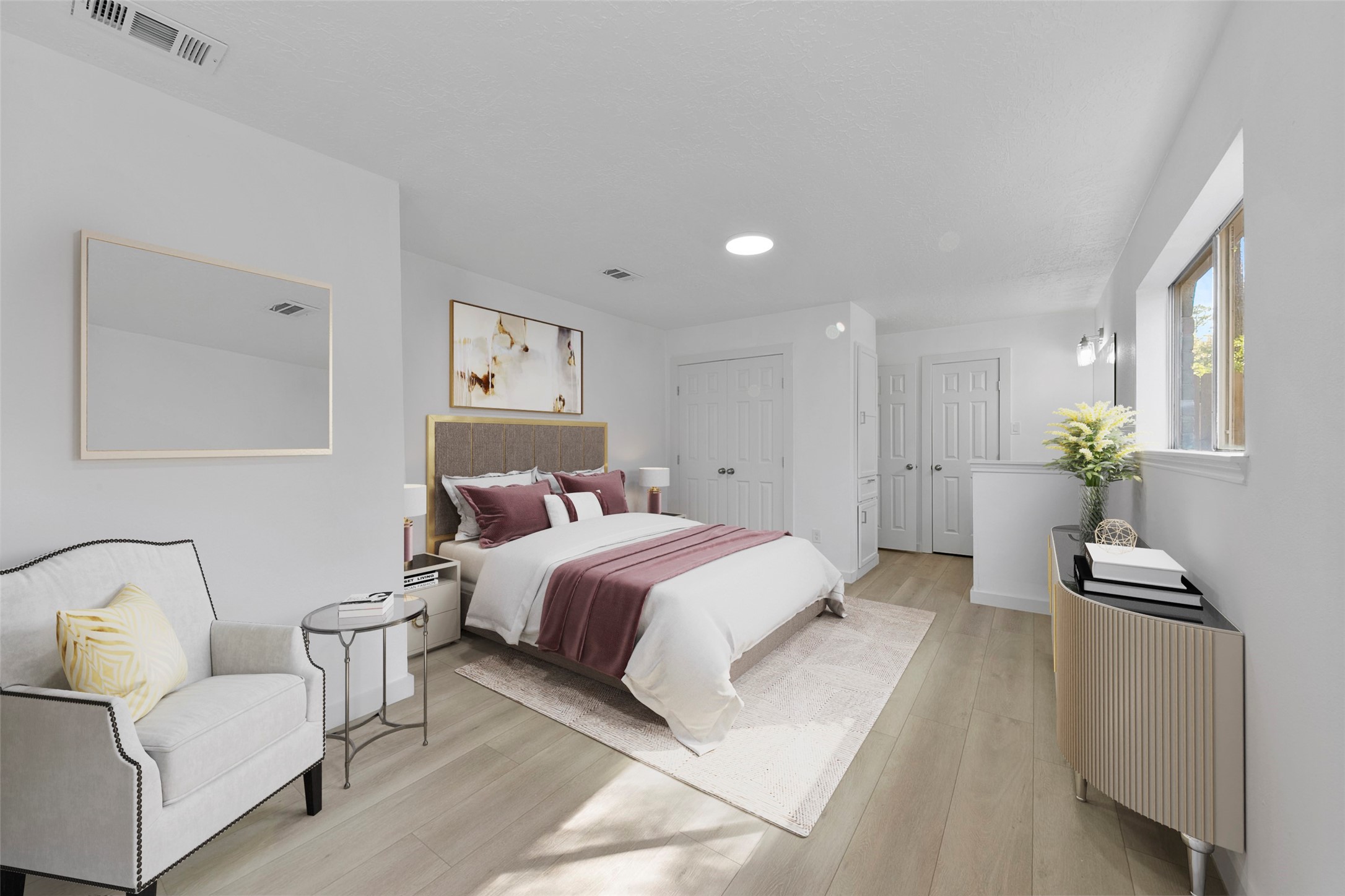 2042 Lexington Woods Drive Spring, TX 77373 - Photo 3 of 32 a spacious bedroom with a bed and a couch